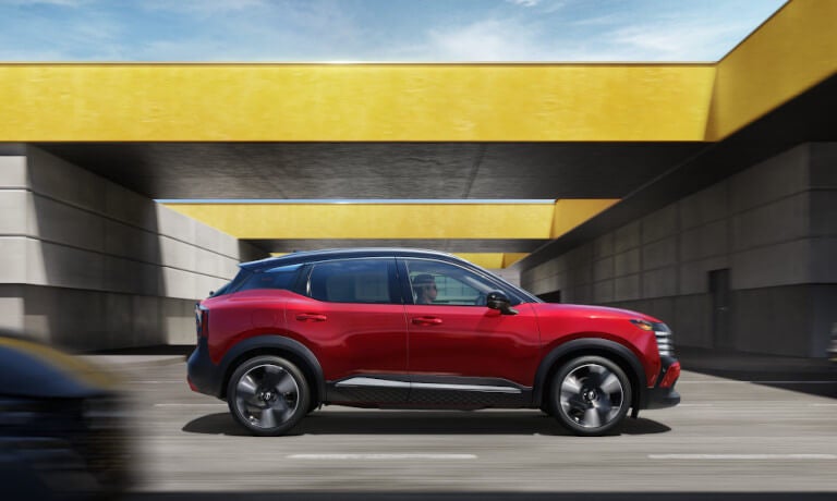 2026 Nissan Kicks side view below overpass