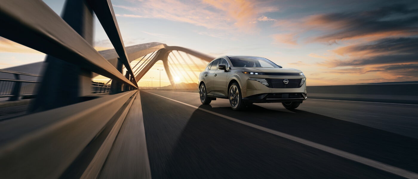 2026 Nissan Murano driving on a bridge