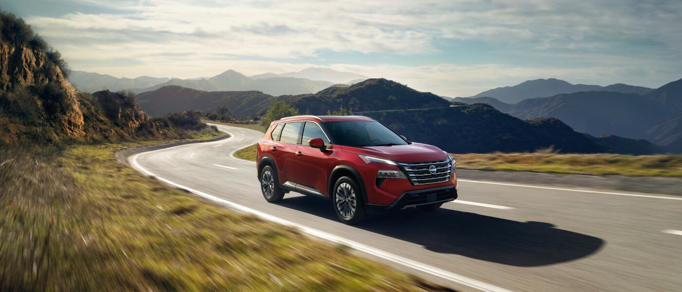 2026 Nissan Rogue Exterior Driving In Hills